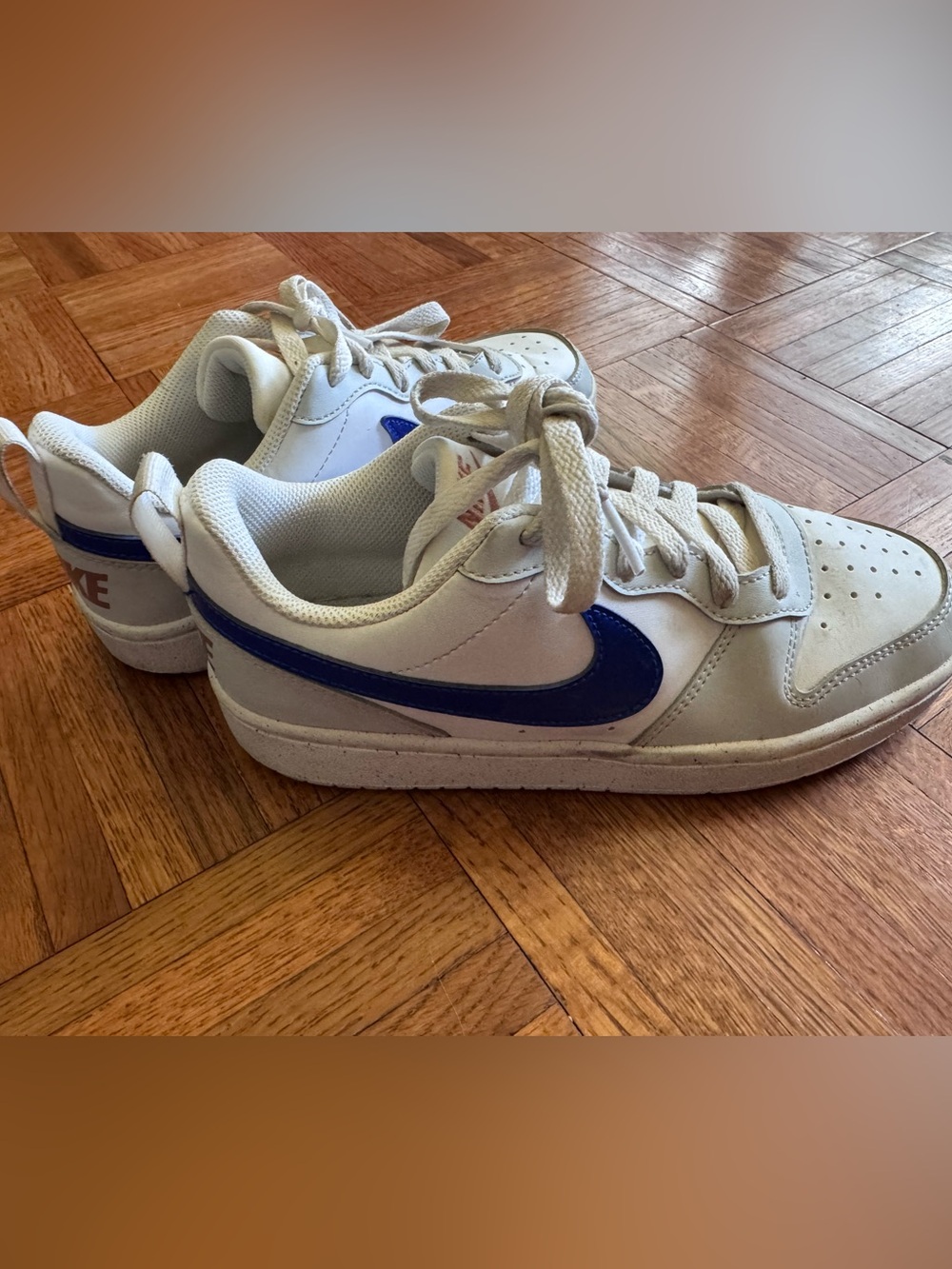 Nike Kids White Sneakers with Blue Swoosh